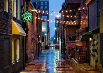 A photo of an alley at twilight.