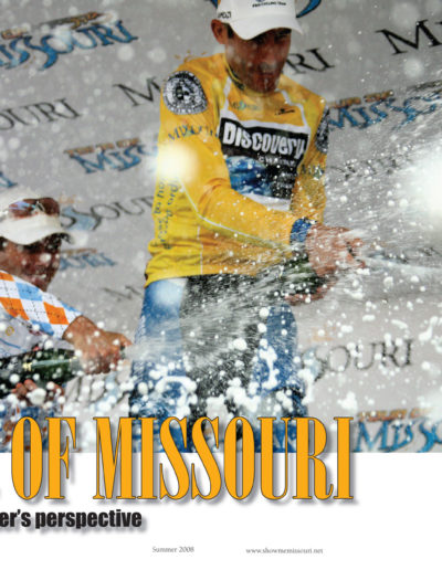 Riders celebrating with Champagne at the finish of the Tour of Missouri.