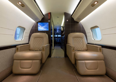 Airplane cabin interior photograph.