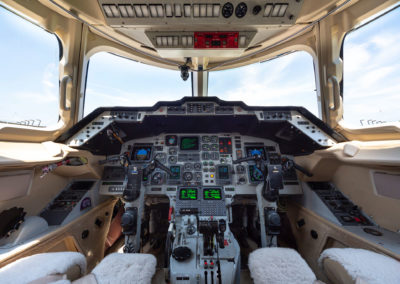 An interior photograph of a jet cockpit.