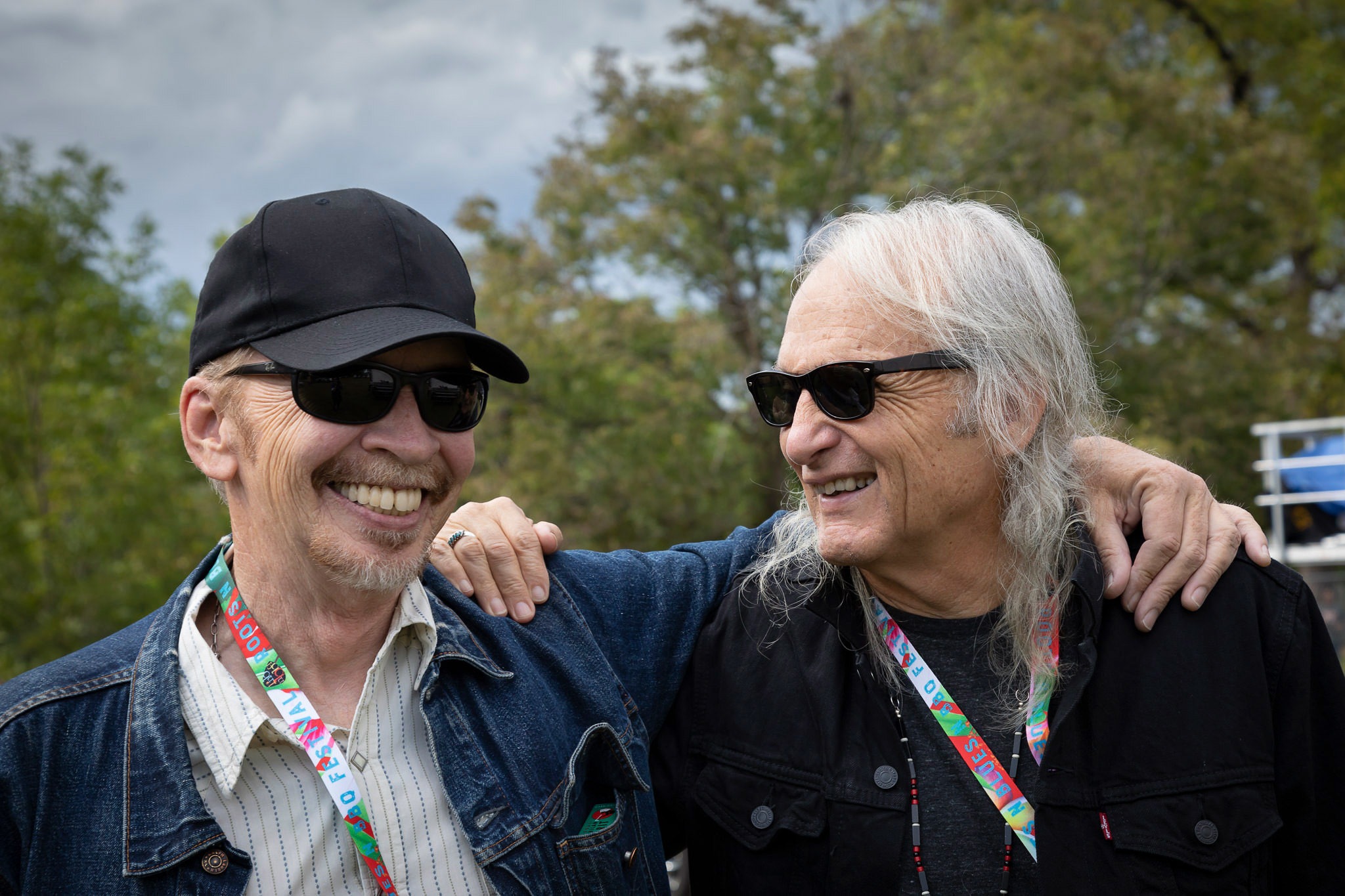 An image of two musicians at a music festival.